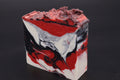 Voided Flesh soap bars stacked showing textured top and bold color swirls