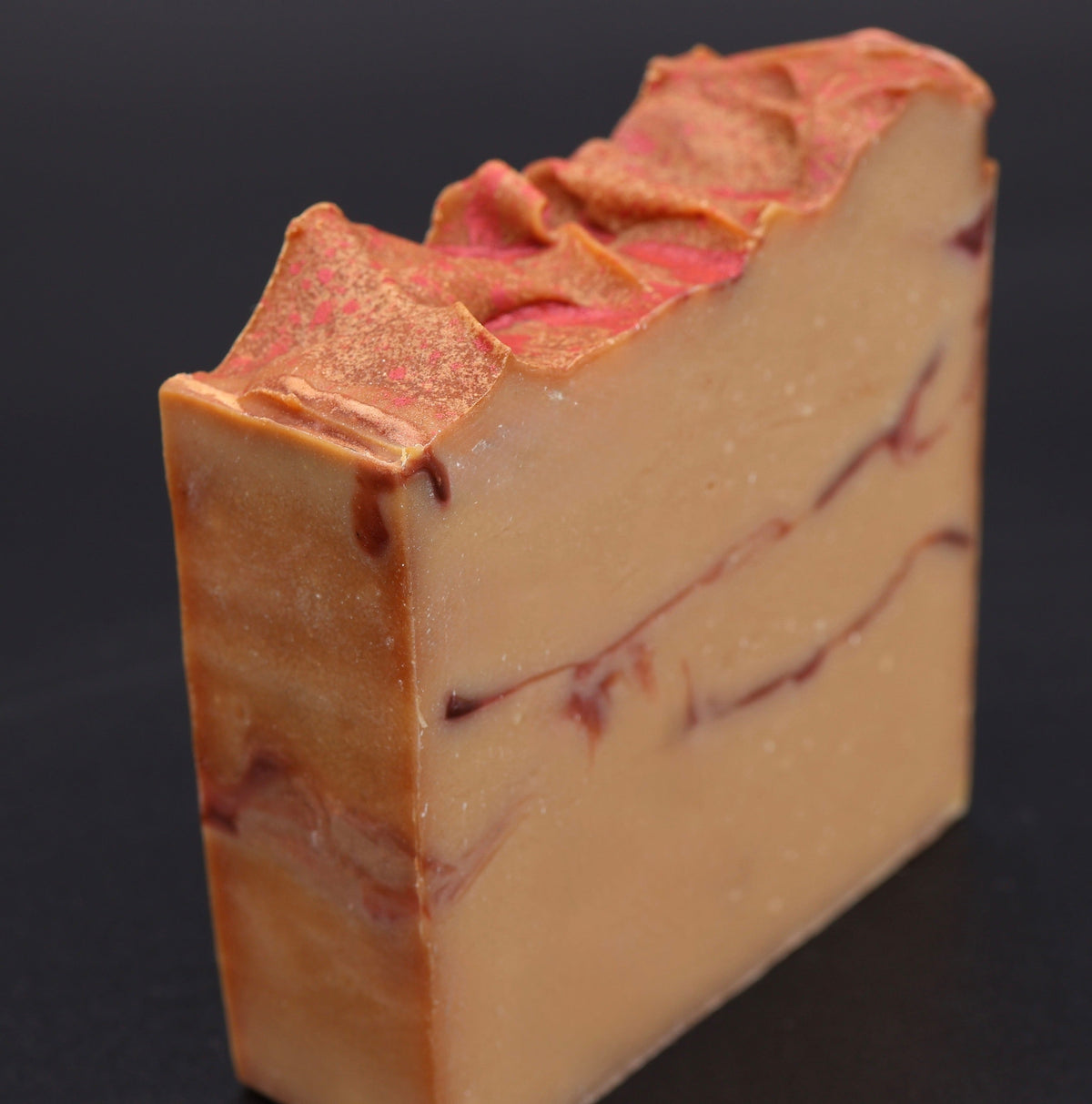 Fall Harvest soap single bar showing warm golden tones with pink swirls on top