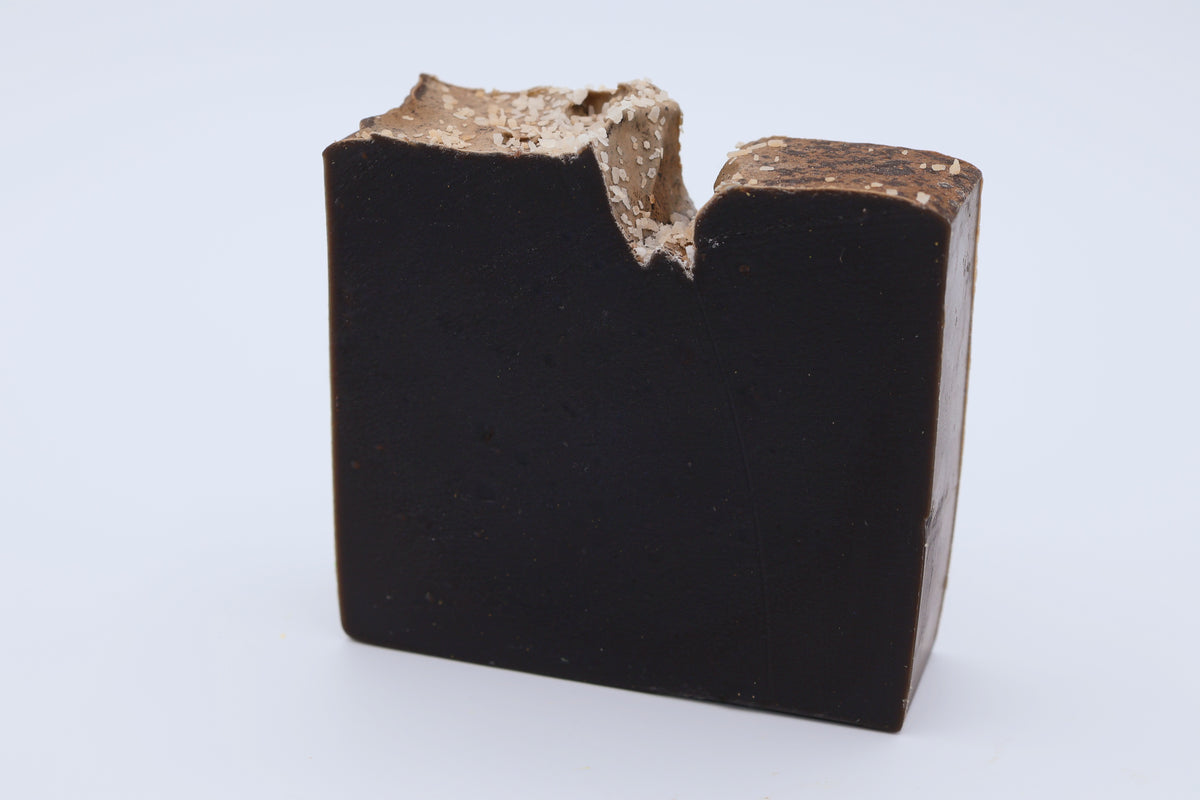 Top and side view of Smugglers Cove handcrafted soap bar with decorative salt crystals