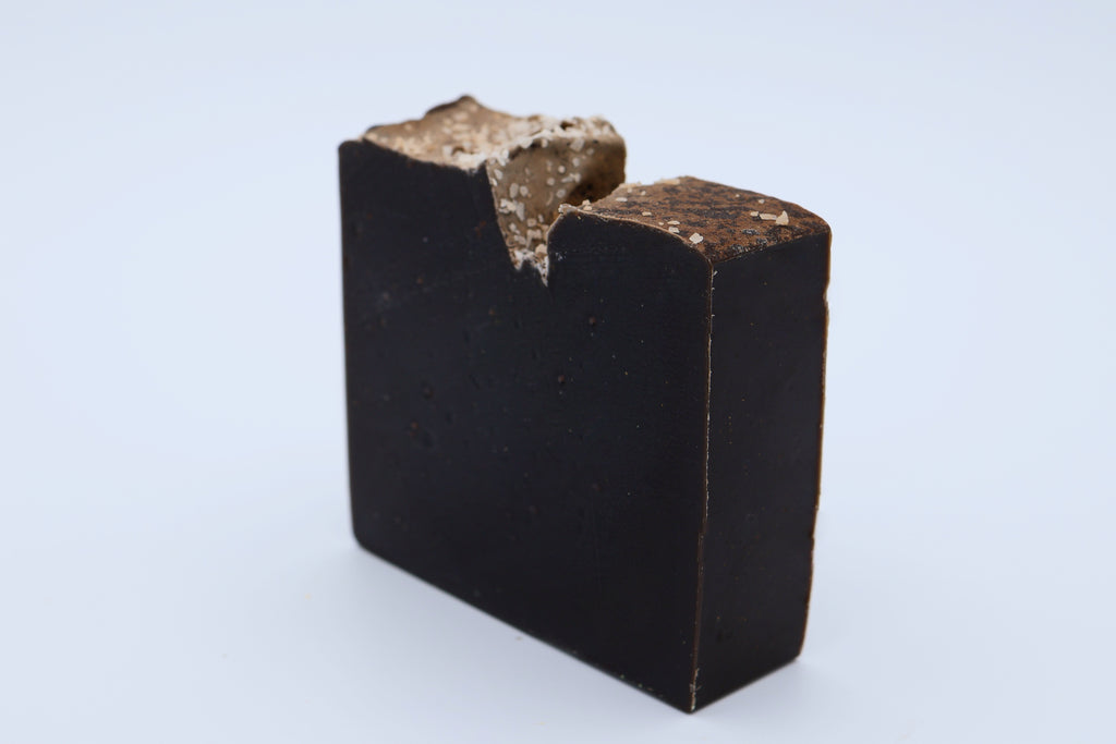 Front view of black Smugglers Cove tobacco and vanilla soap bar